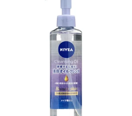 Clear bottle of Nivea Cleansing Oil with a purple and blue label and a light purple pump.