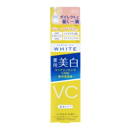 Close-up of a hand squeezing a yellow tube of Kose Moisture Mild White Repair Essence C100