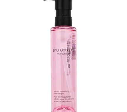 Pink transparent bottle of Shu Uemura Porefinist 2 Sakura Refreshing Cleansing Oil with a black pump.