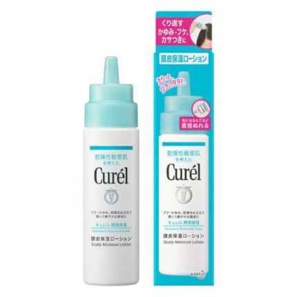 A 120ml dropper bottle of Curel Scalp Moisturizing Lotion beside its plastic packet.
