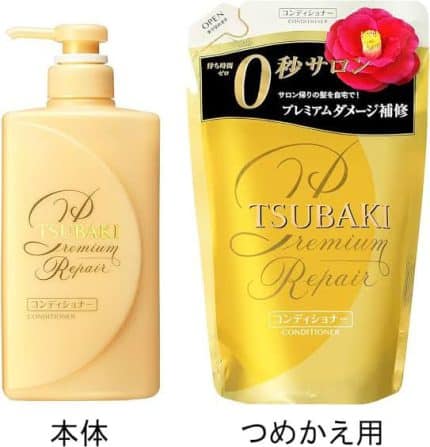 A 660ml refill packet of TSUBAKI Premium Repair Hair Conditioner sealed in plastic packaging beside its pump bottle.