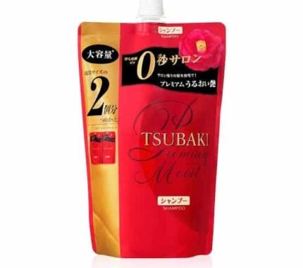 A 660ml refill packet of TSUBAKI Premium Moist Shampoo sealed in plastic packaging.