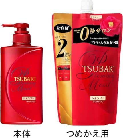 A 660ml refill packet of TSUBAKI Premium Moist Shampoo sealed in plastic packaging beside its pump bottle.