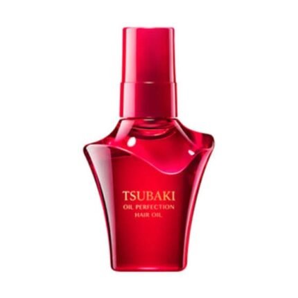 A 50 ml pump bottle of TSUBAKI Oil Perfection Hair Treatment.