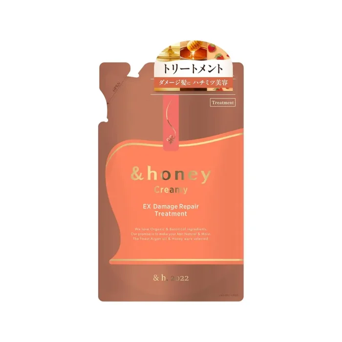 A refill packet of & Honey Creamy EX Damage Repair Hair Treatment in sealed plastic packaging.