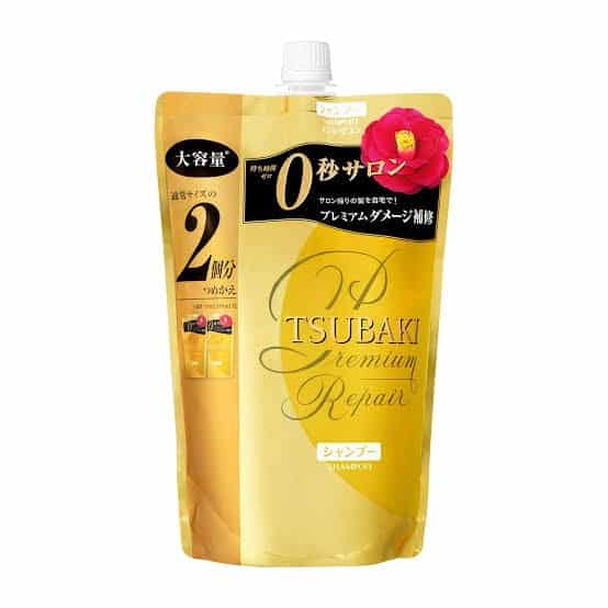 A 660ml refill packet of TSUBAKI Premium Repair Shampoo sealed in plastic packaging.