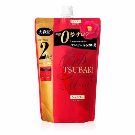 A 660ml refill packet of TSUBAKI Premium Moist Shampoo sealed in plastic packaging.