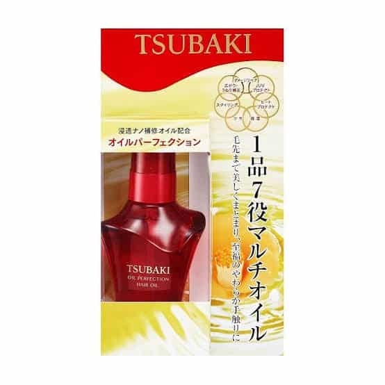 A 50 ml pump bottle of TSUBAKI Oil Perfection Hair Treatment. In paper packaging.